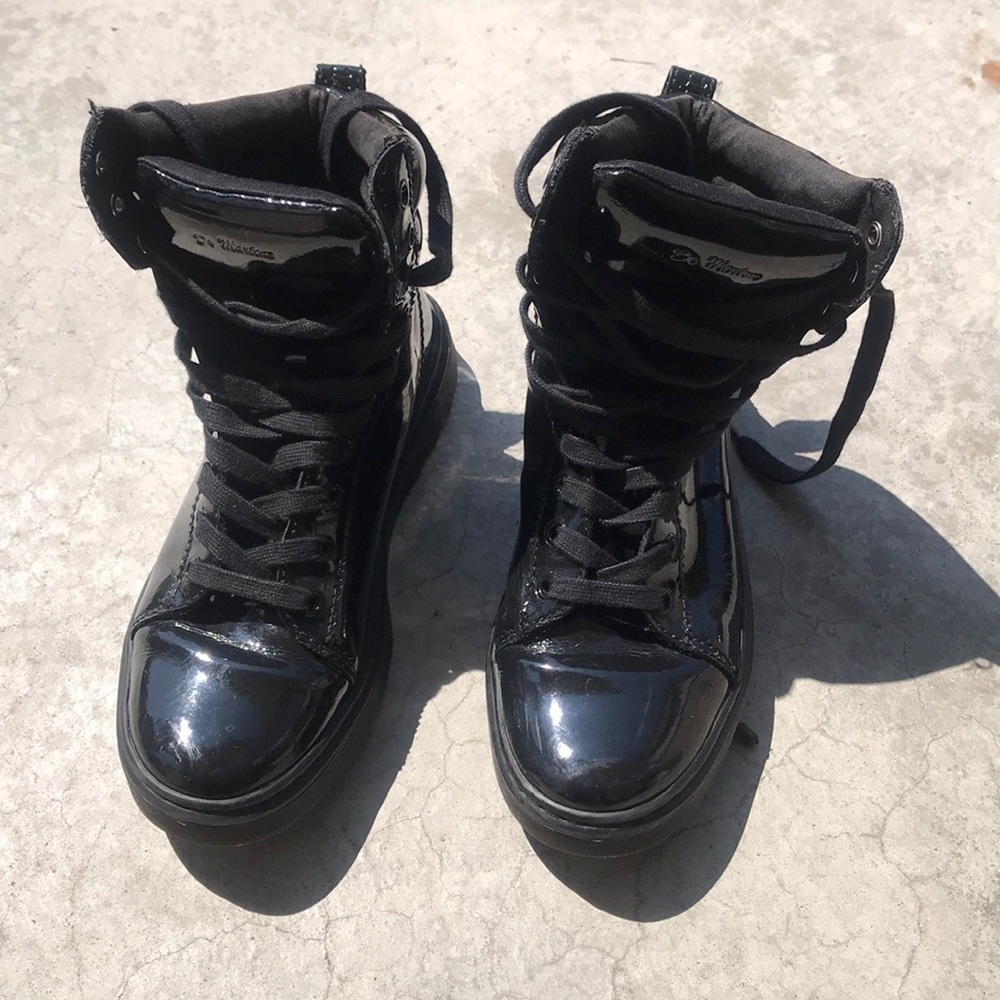 Patent leather Dr. Marten boots.